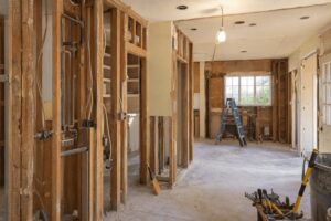 Kitchen Remodel Cost in Santa Barbara County: 2026 Price Guide 2 Outdated electrical wiring and copper plumbing exposed behind walls during a kitchen gut remodel in an older Santa Barbara home, a common source of hidden remodel costs